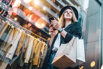 woman using the swagbucks app for shopping 