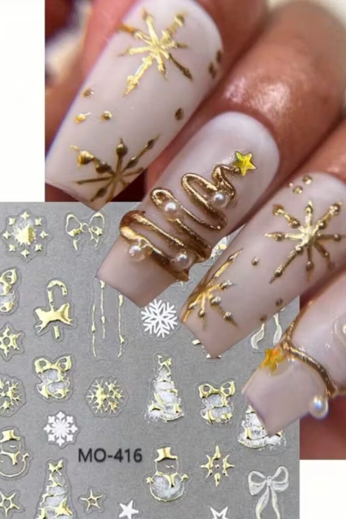 Red and gold Christmas nails with glitter snowflakes